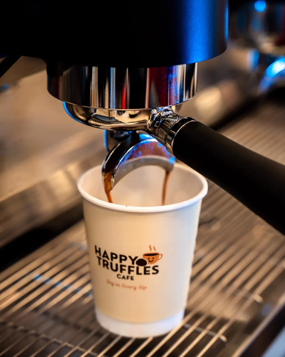 Espresso pouring into a Happy Truffles cup